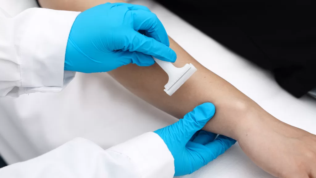 shave any excess hair from the arm